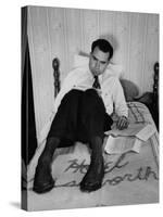 Vice Presidential Candidate Richard M. Nixon Sitting on His Hotel Bed Reviewing Paperwork-Cornell Capa-Stretched Canvas