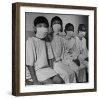 Victims of a Bomb in Hiroshima Waiting to Be Examined by A.B.C.C-Carl Mydans-Framed Photographic Print