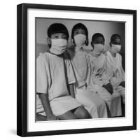 Victims of a Bomb in Hiroshima Waiting to Be Examined by A.B.C.C-Carl Mydans-Framed Photographic Print