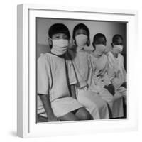 Victims of a Bomb in Hiroshima Waiting to Be Examined by A.B.C.C-Carl Mydans-Framed Photographic Print