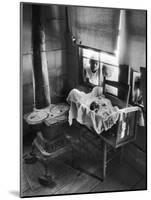 Victoria Cooper's Children Peering in Window Where Newborn Baby Lies in Crib Made from Fruit Crate-W^ Eugene Smith-Mounted Photographic Print