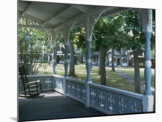 Victorian Front Porch W. Rocker and Other Gingerbread Houses in Background-Alfred Eisenstaedt-Mounted Photographic Print