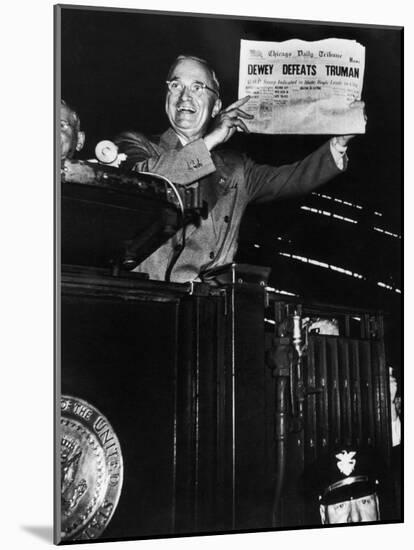 Victorious President Harry Truman Displaying Chicago Daily Tribune Headline, Dewey Defeats Truman-W^ Eugene Smith-Mounted Photographic Print
