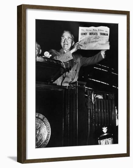 Victorious President Harry Truman Displaying Chicago Daily Tribune Headline, Dewey Defeats Truman-W^ Eugene Smith-Framed Photographic Print