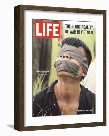 Viet Cong Prisoner of Cape Batangan Battle, Awaiting Transfer to US POW Compound, November 26, 1965-Paul Schutzer-Framed Photographic Print