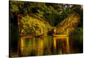 Vietnam. Butterfly net fishing. Fishermen working in complete synchronization.-Tom Norring-Stretched Canvas