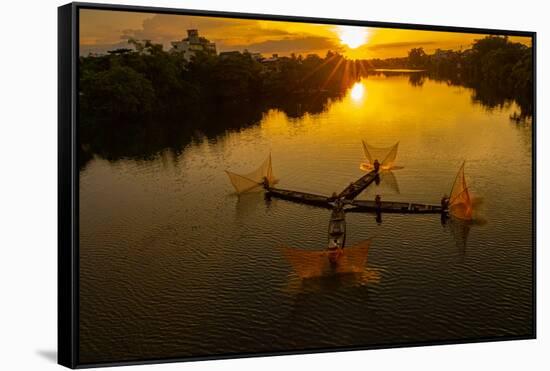 Vietnam. Coordinated lagoon fishing with nets at sunset.-Tom Norring-Framed Stretched Canvas