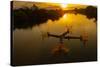 Vietnam. Coordinated lagoon fishing with nets at sunset.-Tom Norring-Stretched Canvas