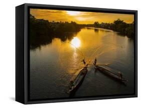 Vietnam. Coordinated lagoon fishing with nets at sunset.-Tom Norring-Framed Stretched Canvas