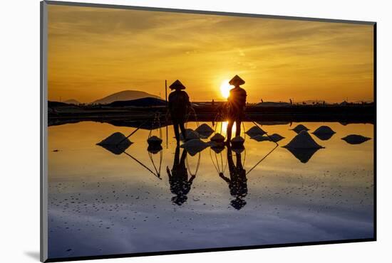 Vietnam. Doc Let Salt lake. Workers harvesting the salt. Early morning sunrise.-Tom Norring-Mounted Photographic Print