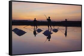 Vietnam. Doc Let Salt lake. Workers harvesting the salt. Early morning sunrise.-Tom Norring-Framed Stretched Canvas