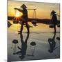 Vietnam. Doc Let Salt lake. Workers harvesting the salt. Early morning sunrise.-Tom Norring-Mounted Photographic Print