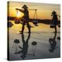 Vietnam. Doc Let Salt lake. Workers harvesting the salt. Early morning sunrise.-Tom Norring-Stretched Canvas