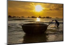 Vietnam. Fishermen deliver the nights catch to the beach at Hoi An.-Tom Norring-Mounted Photographic Print
