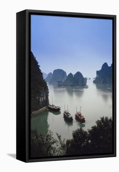 Vietnam, Halong Bay, Tourist Boats Anchor at the Cave of Marvels-Walter Bibikow-Framed Stretched Canvas