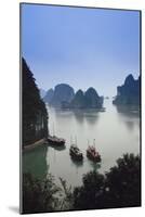 Vietnam, Halong Bay, Tourist Boats Anchor at the Cave of Marvels-Walter Bibikow-Mounted Photographic Print