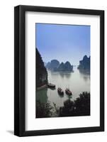 Vietnam, Halong Bay, Tourist Boats Anchor at the Cave of Marvels-Walter Bibikow-Framed Photographic Print