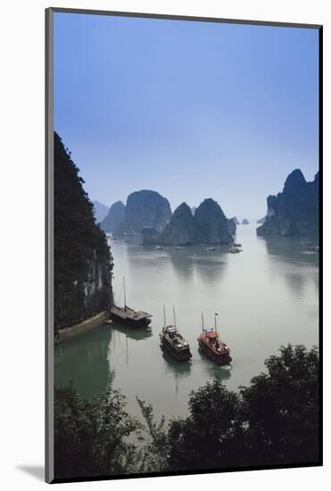 Vietnam, Halong Bay, Tourist Boats Anchor at the Cave of Marvels-Walter Bibikow-Mounted Photographic Print