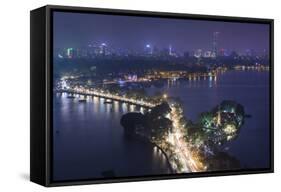 Vietnam, Hanoi. Elevated City View by Tay Ho, West Lake, Dusk-Walter Bibikow-Framed Stretched Canvas