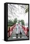 Vietnam, Hanoi, Hoan Kiem Lake. Walking on Huc Bridge in Traditional Ao Dai Dress-Matteo Colombo-Framed Stretched Canvas