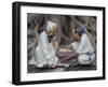 Vietnam, Hanoi. Temple of Literature, painted ceramics of 2 men playing traditional game.-Merrill Images-Framed Photographic Print
