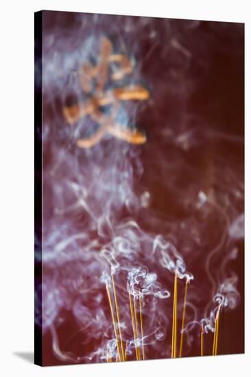 Vietnam, Ho Chi Minh City, Cholon, Chinatown Area, Phuoc an Hoi Quan Pagoda, Burning Incense-Walter Bibikow-Stretched Canvas