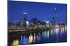 Vietnam, Ho Chi Minh City. City View with Bitexco Tower Along the Ben Nghe Canal, Dusk-Walter Bibikow-Mounted Photographic Print