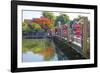 Vietnam. Hoi An bridge over the river with reflections and silk lamps.-Tom Norring-Framed Photographic Print