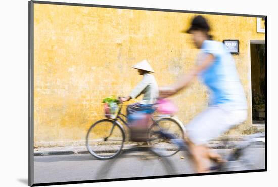 Vietnam, Hoi An. Local People on Bicycle in the Streets of the Town-Matteo Colombo-Mounted Photographic Print