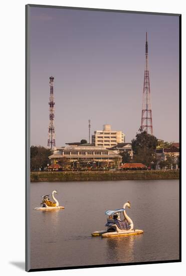 Vietnam, Hue. Perfume River and Tourist Swan Boats, Sunset-Walter Bibikow-Mounted Photographic Print