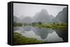 Vietnam, Ninh Binh. Limestone Karsts, with Reflection, in Fog-Matt Freedman-Framed Stretched Canvas