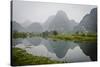 Vietnam, Ninh Binh. Limestone Karsts, with Reflection, in Fog-Matt Freedman-Stretched Canvas