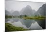 Vietnam, Ninh Binh. Limestone Karsts, with Reflection, in Fog-Matt Freedman-Mounted Photographic Print