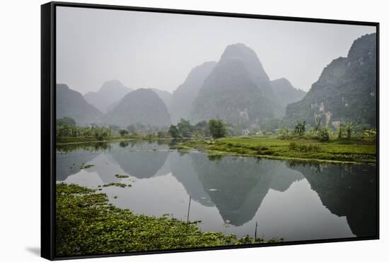 Vietnam, Ninh Binh. Limestone Karsts, with Reflection, in Fog-Matt Freedman-Framed Stretched Canvas