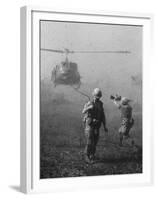 Vietnam War US Helicopter Landing-Henri Huet-Framed Premium Photographic Print