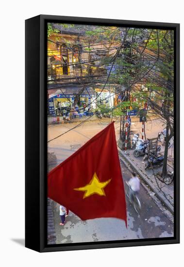 Vietnamese Flag and Street Scene, Hanoi, Vietnam-Peter Adams-Framed Stretched Canvas