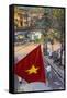 Vietnamese Flag and Street Scene, Hanoi, Vietnam-Peter Adams-Framed Stretched Canvas