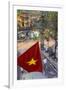 Vietnamese Flag and Street Scene, Hanoi, Vietnam-Peter Adams-Framed Photographic Print