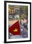 Vietnamese Flag and Street Scene, Hanoi, Vietnam-Peter Adams-Framed Photographic Print