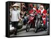 Vietnamese Men Dressed as Santa Claus Wait on their Motorbikes on a Street in Hanoi, Vietnam-null-Framed Stretched Canvas
