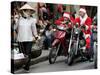 Vietnamese Men Dressed as Santa Claus Wait on their Motorbikes on a Street in Hanoi, Vietnam-null-Stretched Canvas