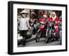 Vietnamese Men Dressed as Santa Claus Wait on their Motorbikes on a Street in Hanoi, Vietnam-null-Framed Photographic Print
