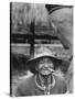 Vietnamese Montagnard Man Smoking Cigarette-Larry Burrows-Stretched Canvas