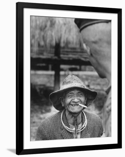 Vietnamese Montagnard Man Smoking Cigarette-Larry Burrows-Framed Photographic Print