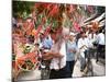 Vietnamese Vendors Crowd a Street Selling Colored Lanterns on a Street in Downtown Hanoi-null-Mounted Photographic Print