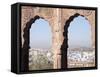 View a Town Through Arched Structure in Jodhpur, Rajasthan, India-David H. Wells-Framed Stretched Canvas