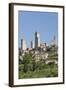 View across Field to Typical Houses and Medieval Towers, San Gimignano, Siena-Ruth Tomlinson-Framed Photographic Print