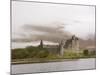 View across Loch Awe to the Ruins of Kilchurn Castle, Early Morning Mist on Mountains-Ruth Tomlinson-Mounted Photographic Print