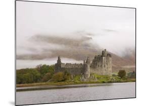 View across Loch Awe to the Ruins of Kilchurn Castle, Early Morning Mist on Mountains-Ruth Tomlinson-Mounted Photographic Print