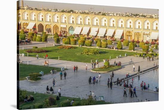 View across Naqsh-e (Imam) Square, UNESCO World Heritage Site, from Ali Qapu Palace, Isfahan, Iran,-James Strachan-Stretched Canvas